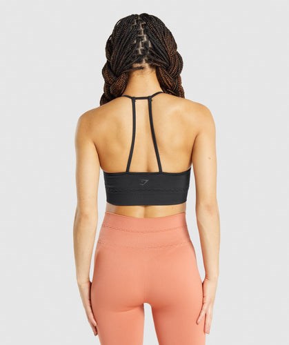 Спортивный бесшовный бра с низкой поддержкой Studio от Gymshark с ребристой текстурой и декоративными элементами на спине 11231826