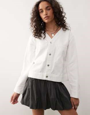 Футболка из денима с V-образным вырезом, длинными рукавами и карманами на груди от Reclaimed Vintage 11226197