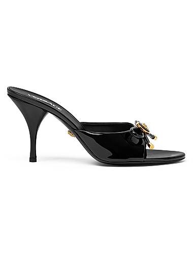 Мюли с открытым носком Opera Bow 85MM из лаковой кожи от Versace с эффектным бантом 11023518