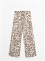 Прямые хлопковые брюки с анималистичным принтом и завязывающимся поясом от Massimo Dutti 11201968