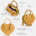 Coach Сумка в форме сердца из мягкой коровьей кожи с регулируемым ремнем и застежкой-молнией через плечо 11264429
