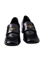 Лоферы Prada из мягкой кожи с металлическим логотипом и 35-мм кожаным каблуком 11029147