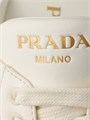 Замшевые туфли-слиперы Prada с эмалированным треугольным верхом и резиновой подошвой 30мм 11011973