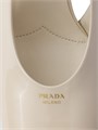 Туфли-слингбеки Prada из лаковой кожи с каблуком 85 мм и логотипом на подошве 11025770